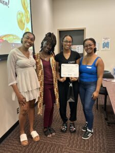 Lily Brown (L3 BScN Student, mentee) holding certificate of completion, pictured with the BNSAS leadership team